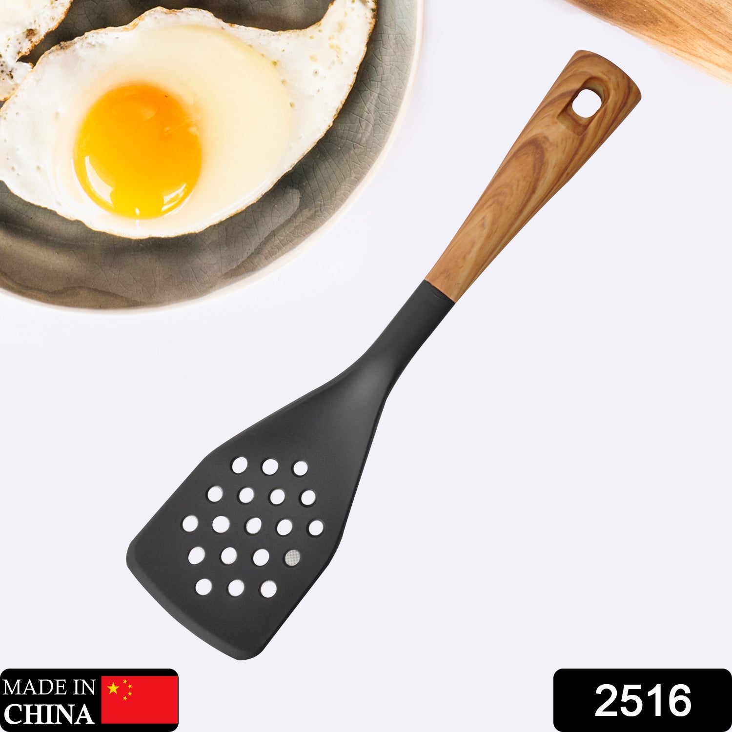 2516 Slotted turner with wooden pattern handle